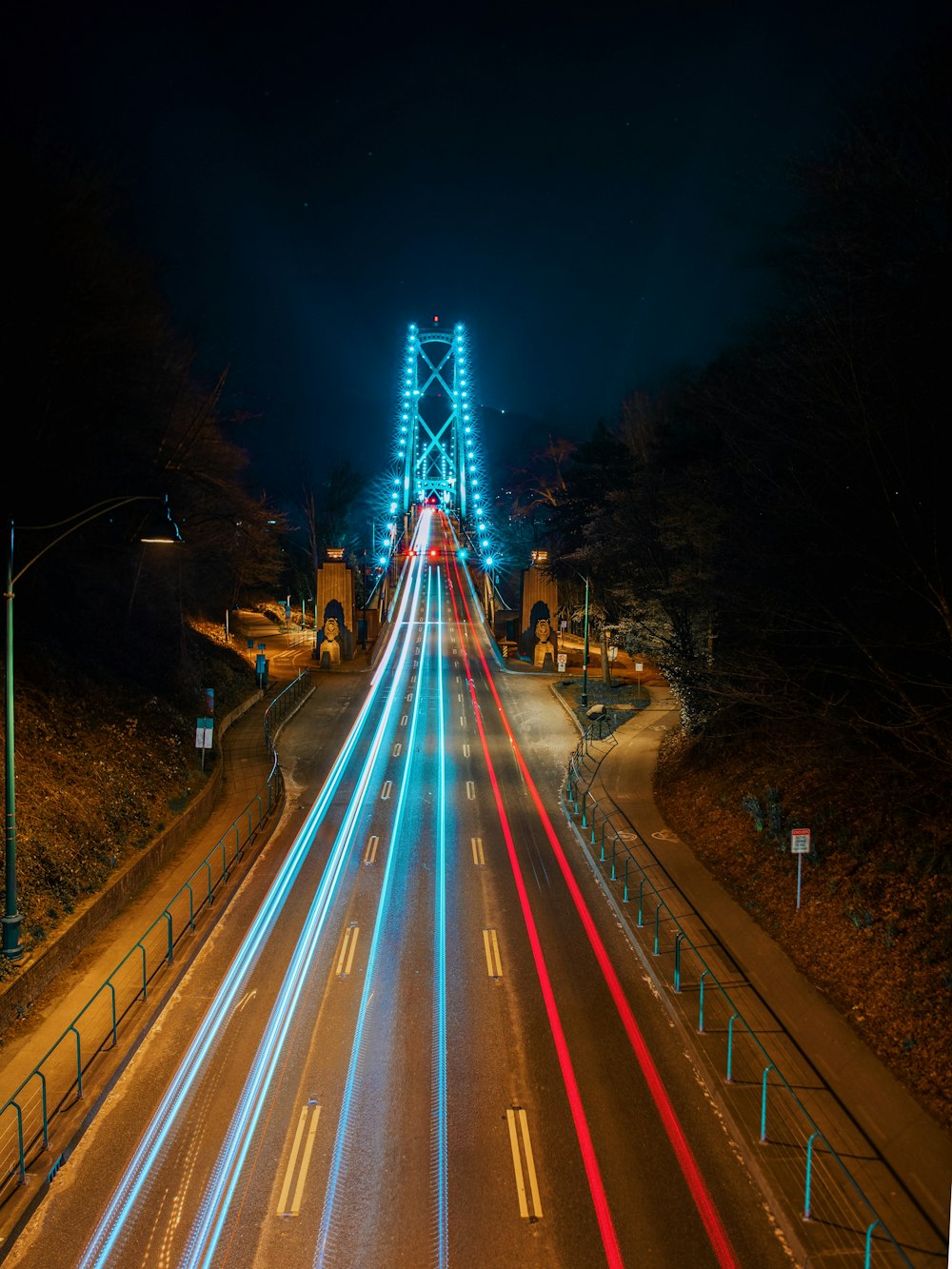 time lapse photography of cars on road during night time