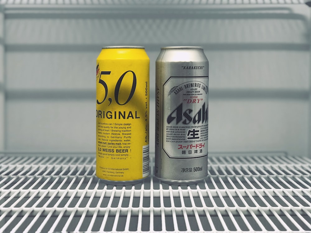 yellow and silver can on white steel rack