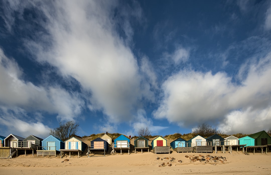 white and brown houses under blue sky