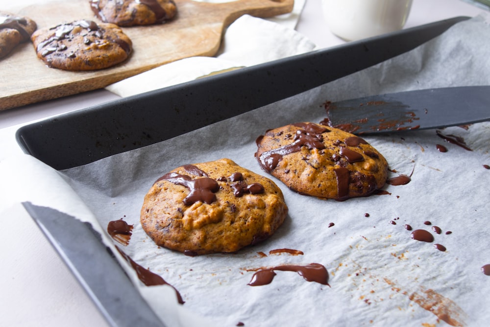 brown cookies on white paper