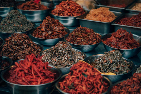 red chili peppers on stainless steel bowl