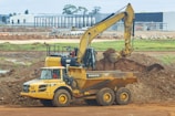 yellow and black UNK loader
