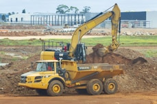 yellow and black UNK loader