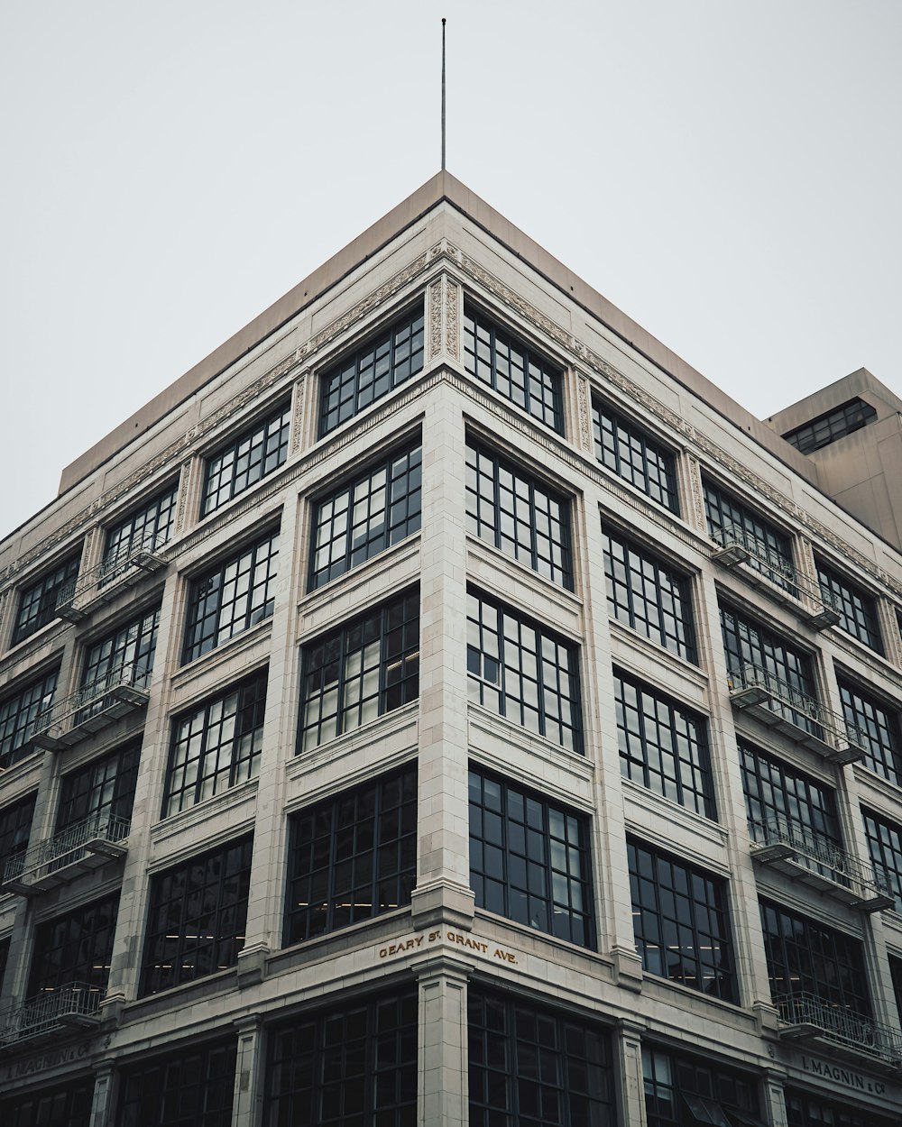 brown concrete building under white sky during daytime