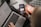 person holding black iphone 4