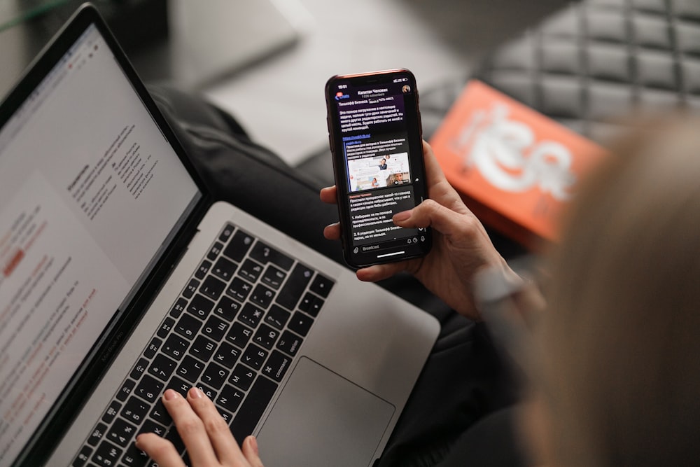 A person reading an message on their phone.