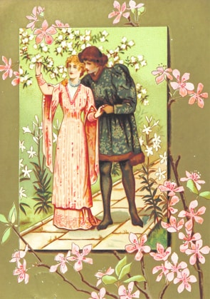 A vintage illustration depicting a man and a woman dressed in period clothing, walking along a path surrounded by blooming flowers and lush greenery. The woman is wearing a long, flowing pink dress with a high collar and intricate patterns, while the man is clad in a dark, ornate tunic. Delicate pink flowers and green leaves embellish the border of the image, creating a whimsical and romantic atmosphere.