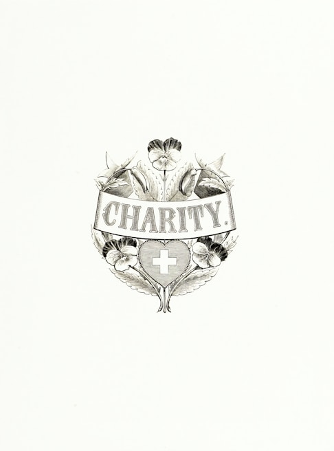 An elegant emblem featuring the word 'Charity' at its center, surrounded by detailed floral designs and a heart-shaped symbol containing a cross. The composition is monochromatic and appears classic and intricate.