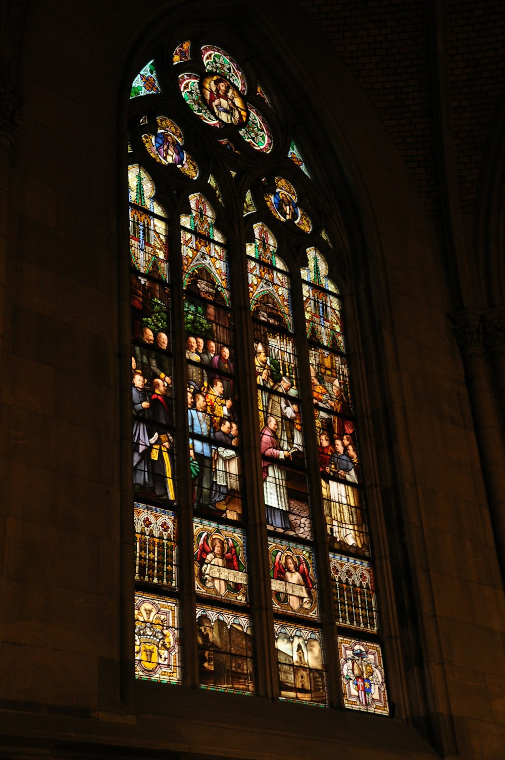 red blue and yellow glass window