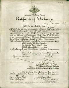 A formal document titled 'Certificate of Discharge' from the Australian Military Forces. It contains printed and handwritten text certifying the discharge of a private, along with dates, service details, and signatures. The background is a light, aged paper, with a green border and an emblem at the top center.