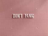 i love you text on pink and white polka dot background