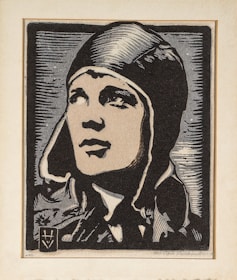 A stylized portrait of a person wearing a leather aviator cap and jacket, rendered in a monochrome, graphic style. The use of strong lines and shading emphasizes the facial features, creating a striking and bold depiction.
