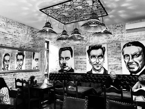 Guests enjoying a sophisticated corporate dinner with subtle monochrome decor.