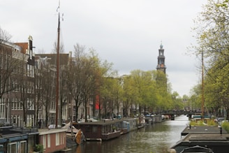 people riding on boat on river during daytime