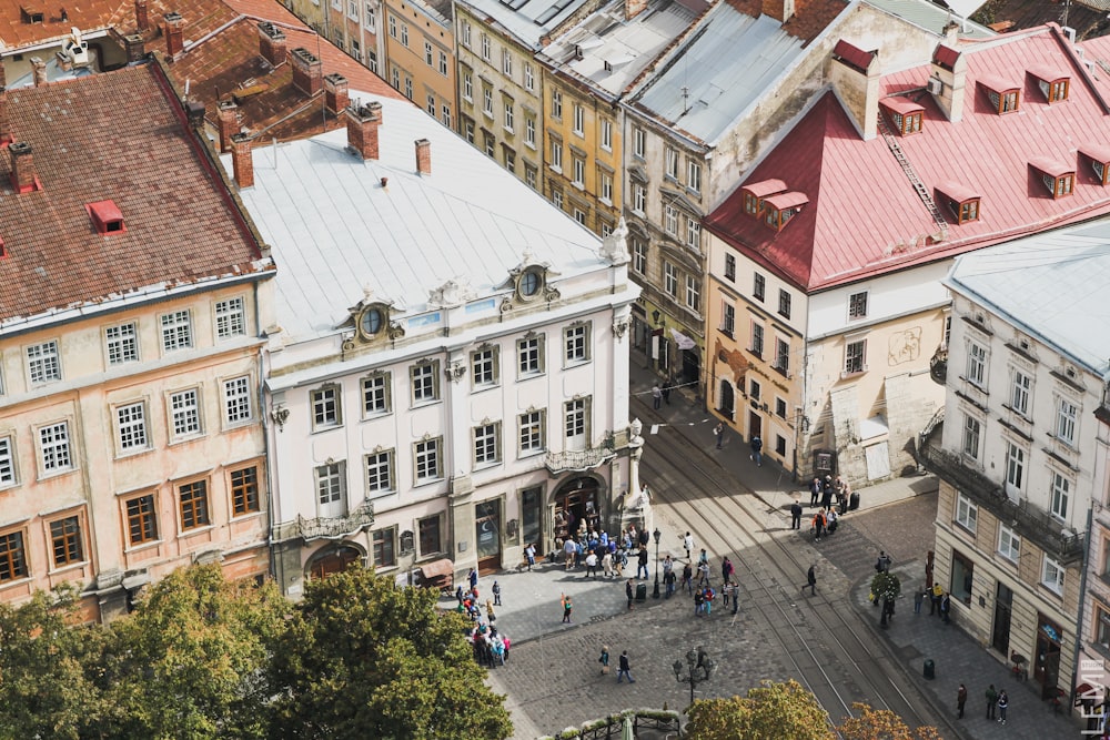 people walking on street near buildings during daytime