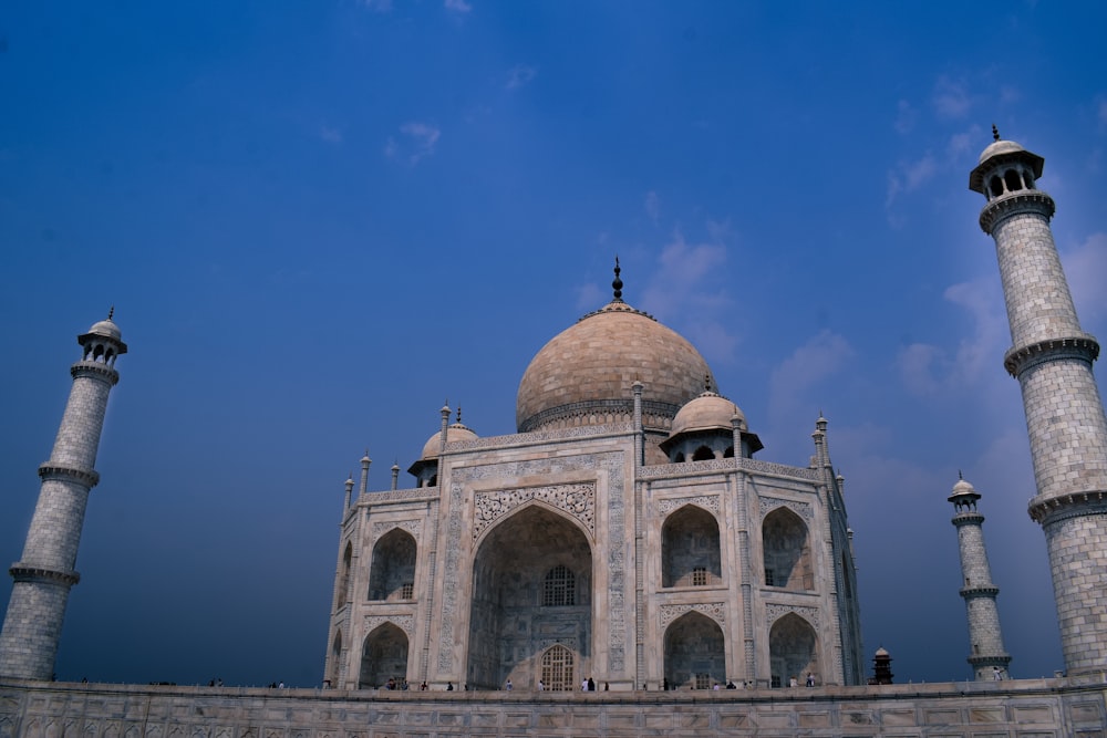 brown concrete dome building under blue sky during daytime