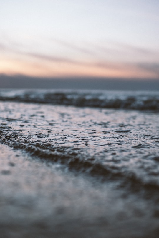 ocean waves under cloudy sky during daytime in Mangaļsala Latvia