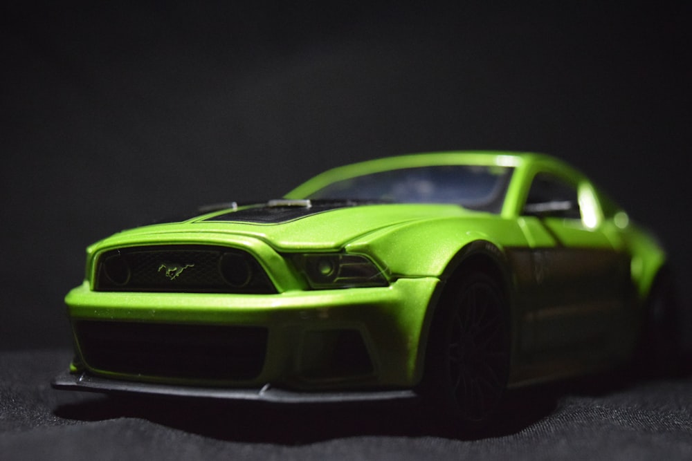 green lamborghini aventador on black background