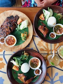 cooked meat on blue ceramic plate