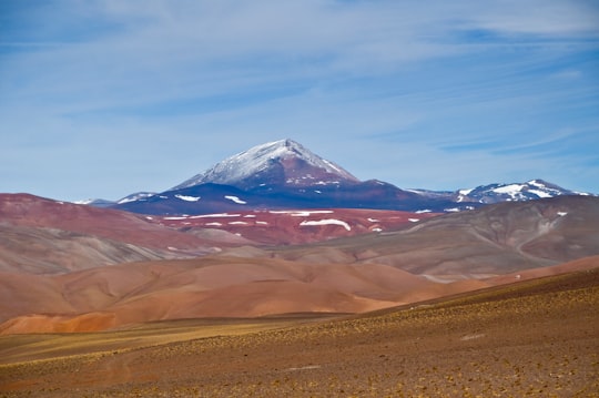 brown and white mountain under blue sky during daytime in San Juan Argentina