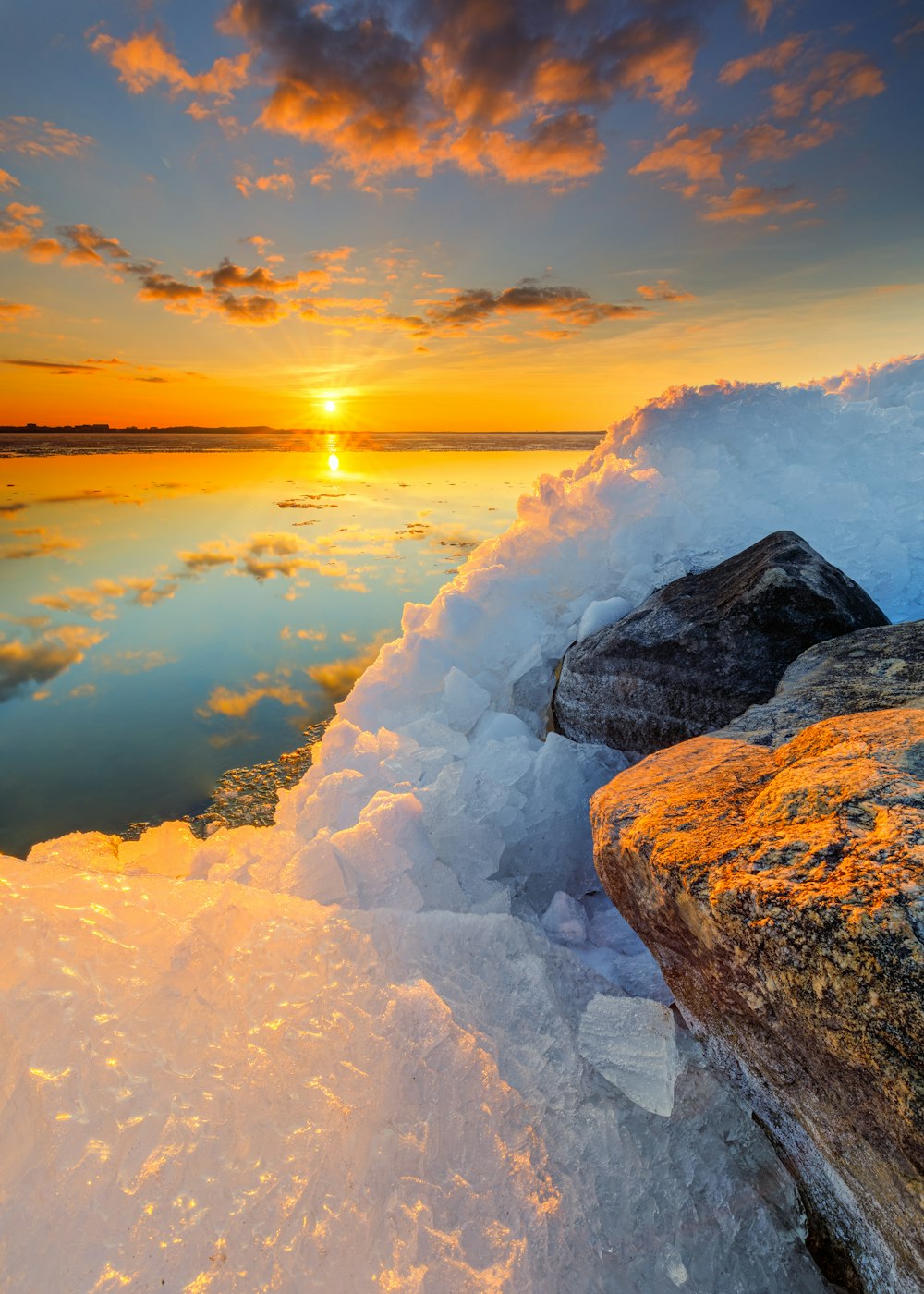 gray rocky shore during sunset