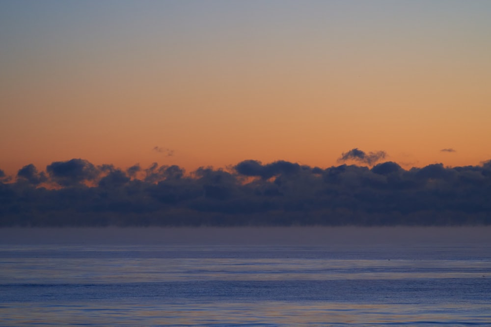 blue sky and white clouds over the sea