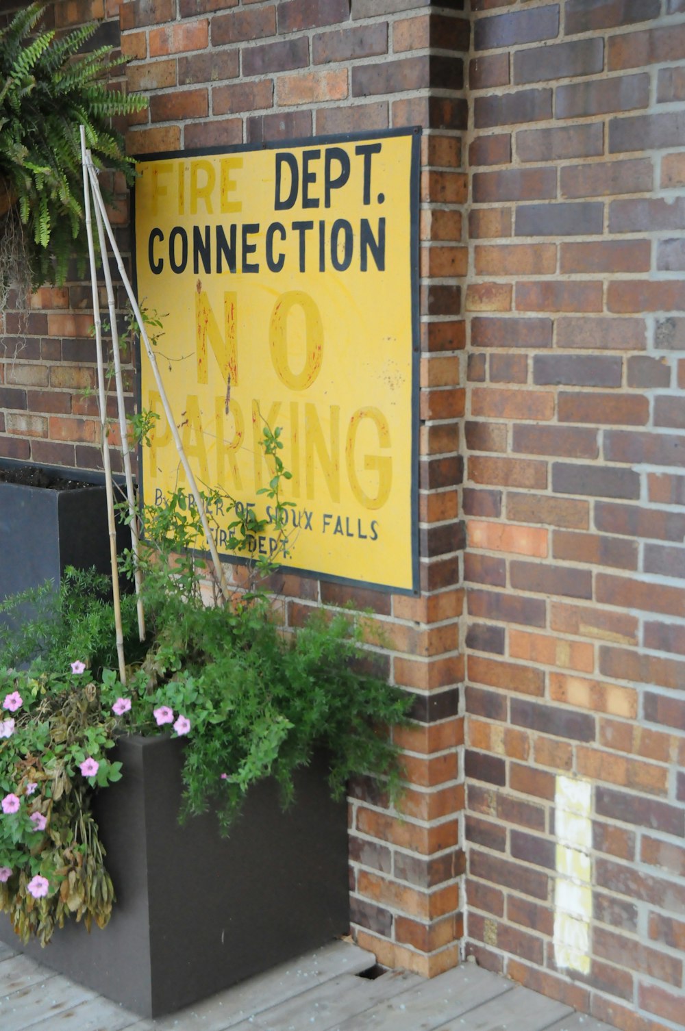 yellow and black no smoking signage