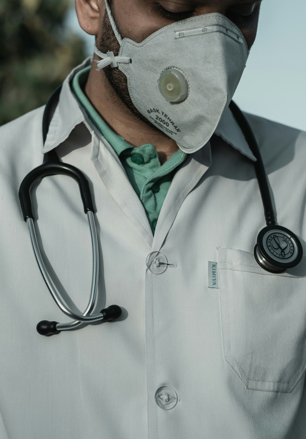 person in white and black stethoscope