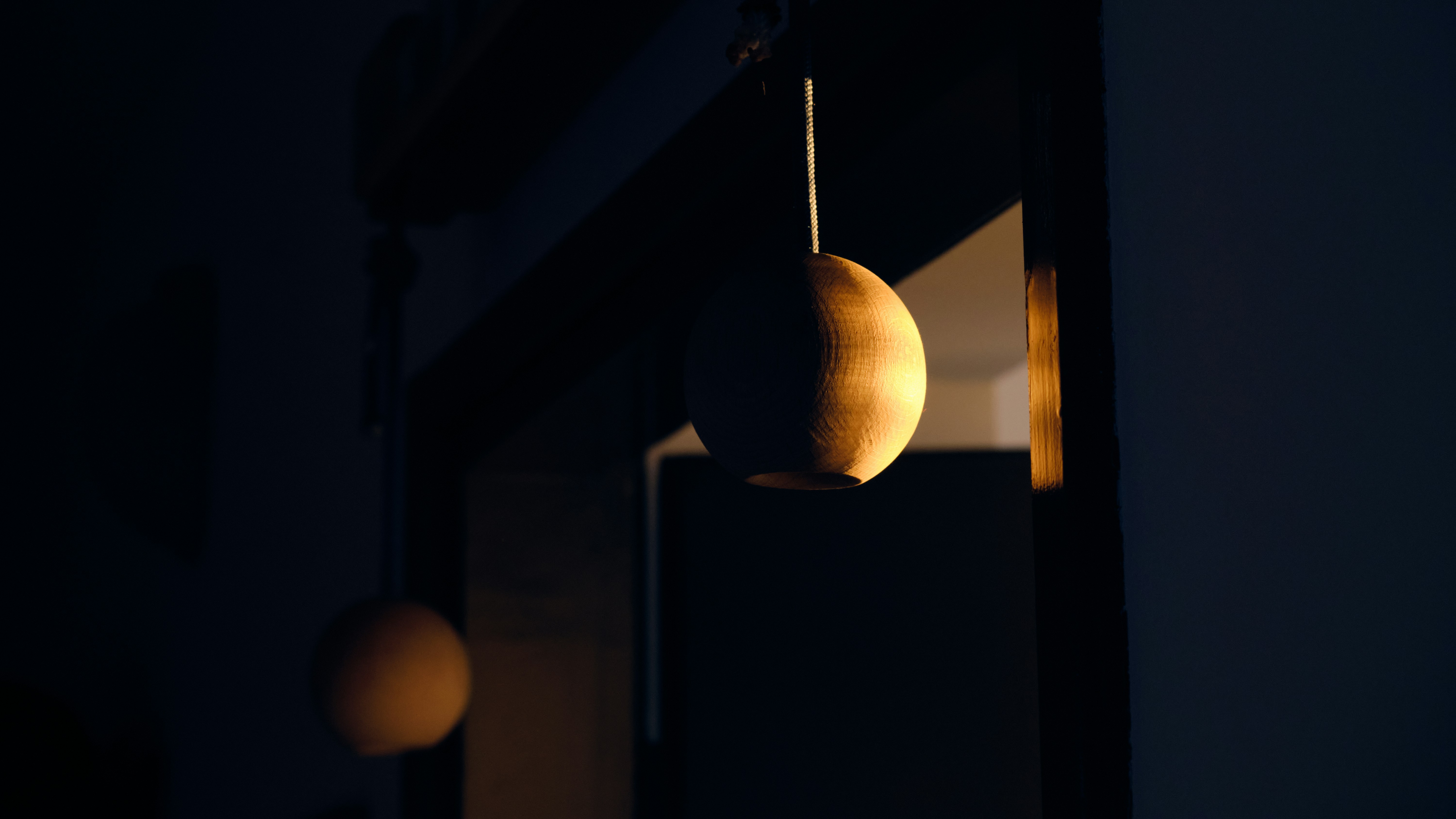 brown pendant lamp turned on during nighttime