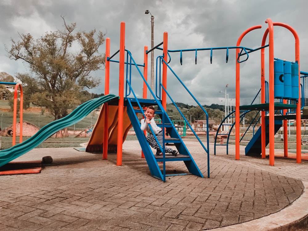 blue and red playground swing