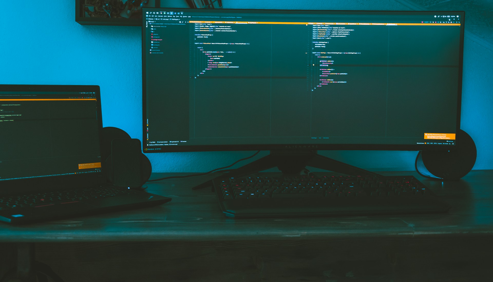 A sleek, modern workspace with multiple screens displaying complex algorithm visualizations and code snippets, bathed in soft blue light.