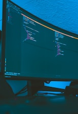 Developers collaborating over code with futuristic AI interface elements floating around.