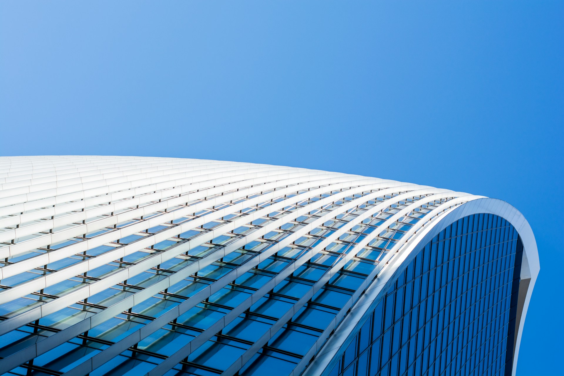white and blue glass building