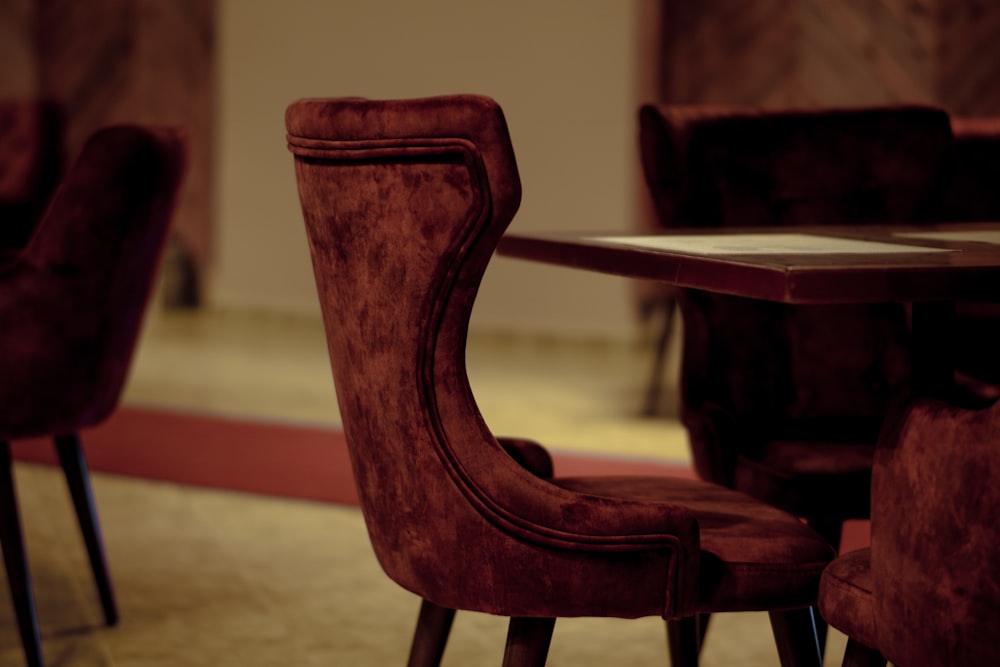 brown wooden armchair beside brown wooden table