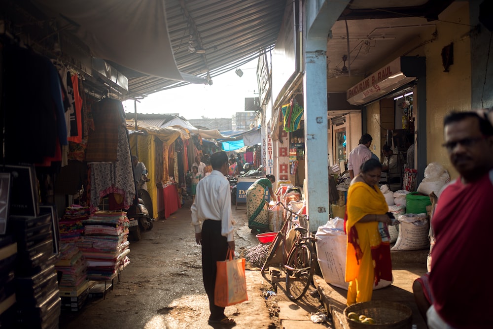 people in market during daytime