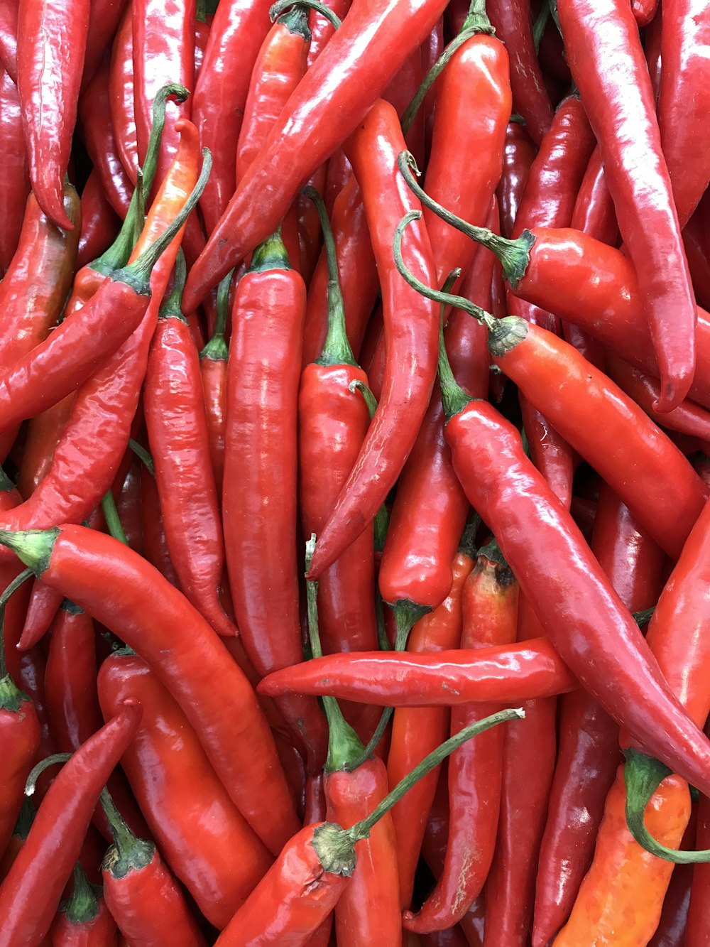 red chili lot on brown surface