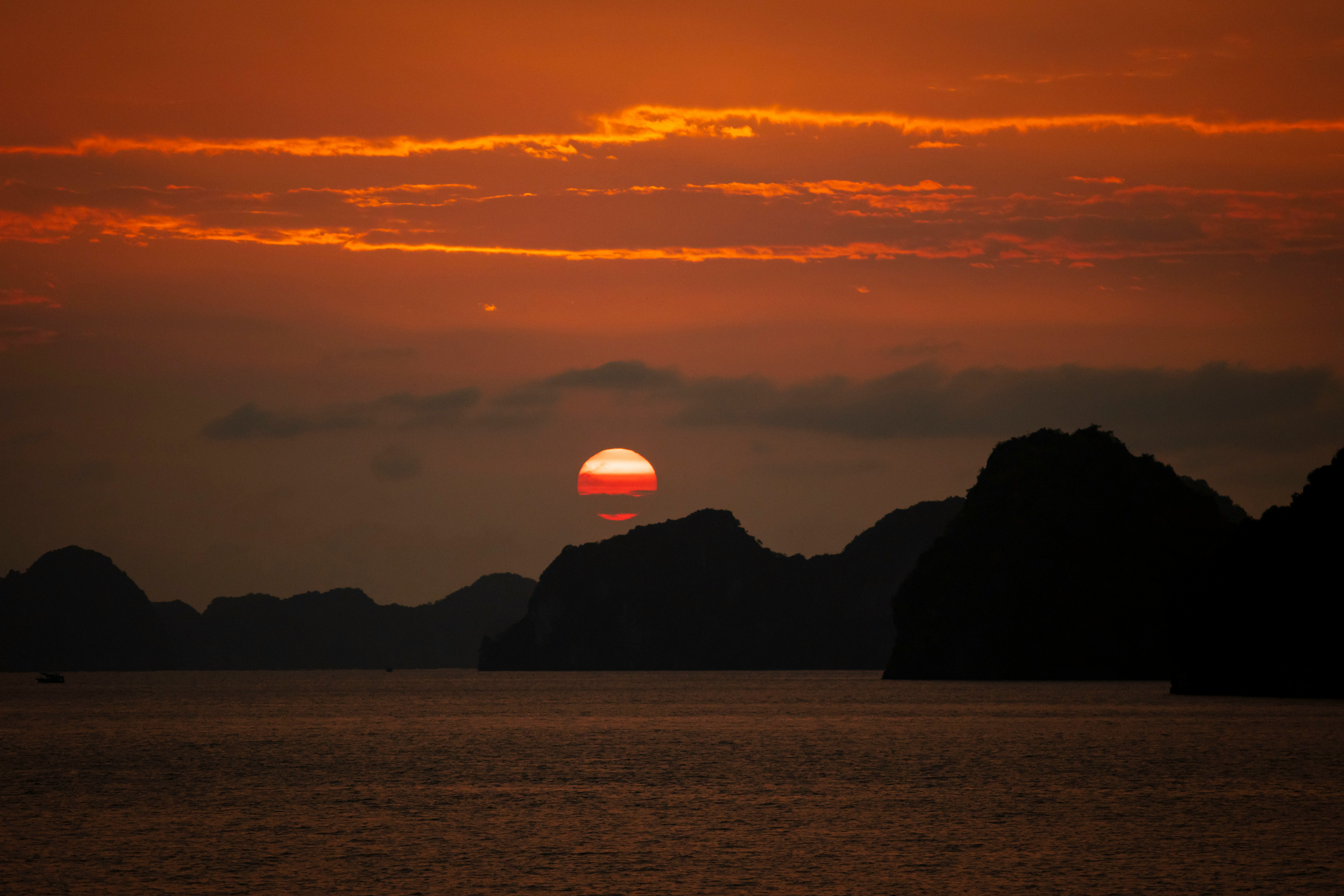 silhouette of mountain during sunset