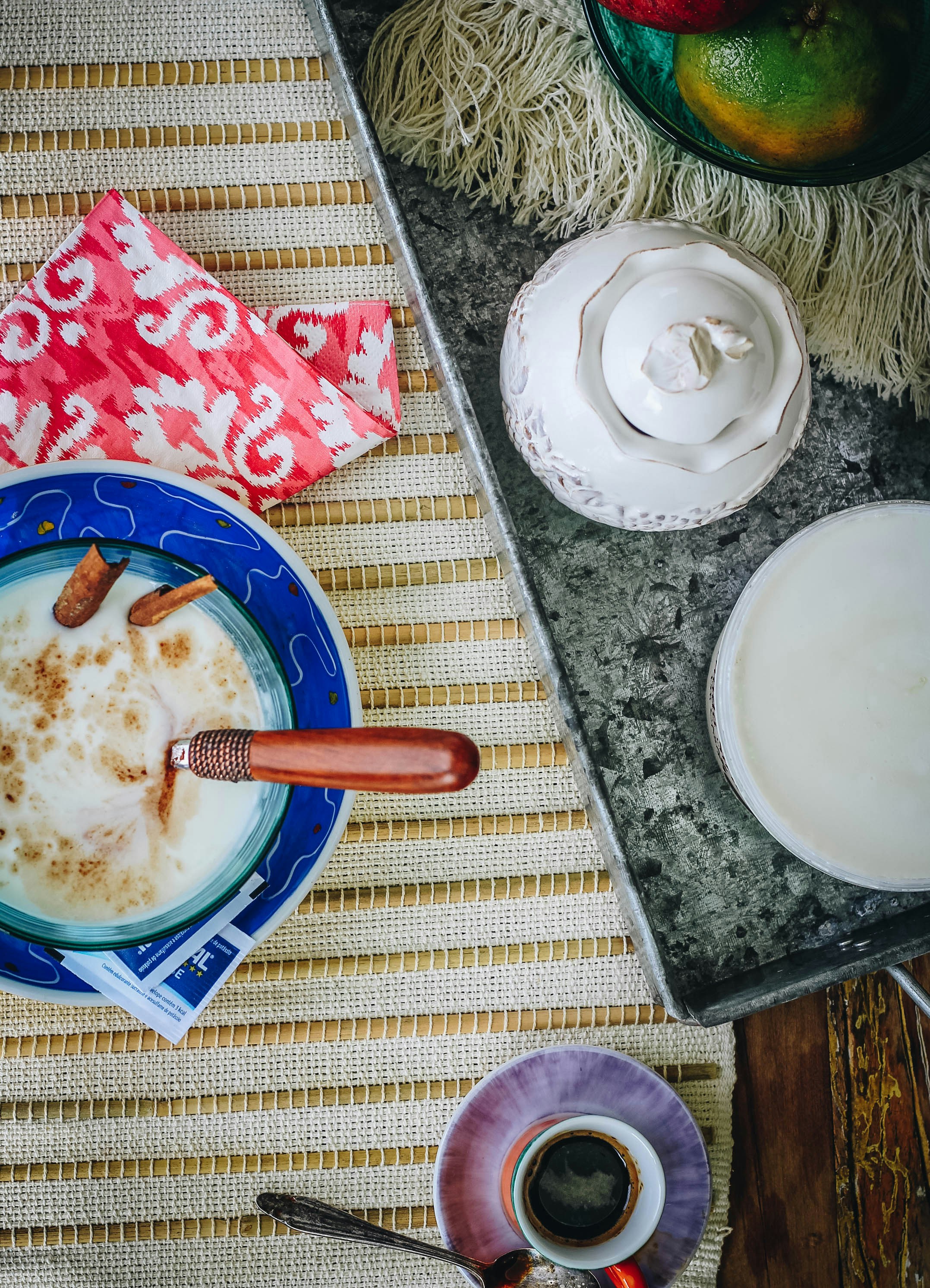 white ceramic round plate on brown wooden table