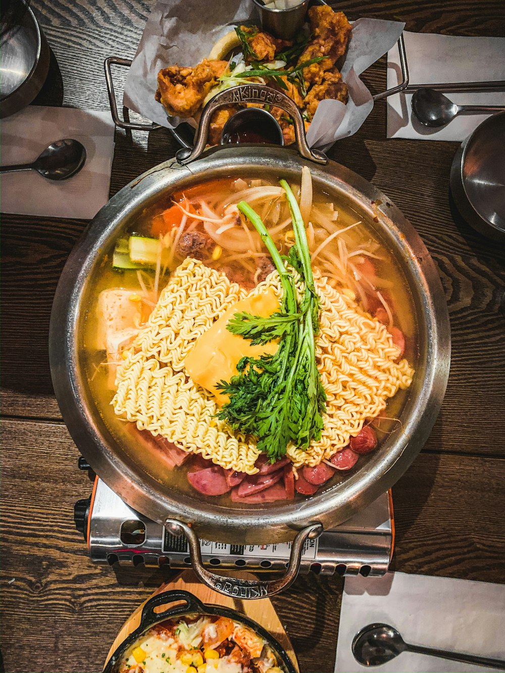 brown wooden bowl with soup