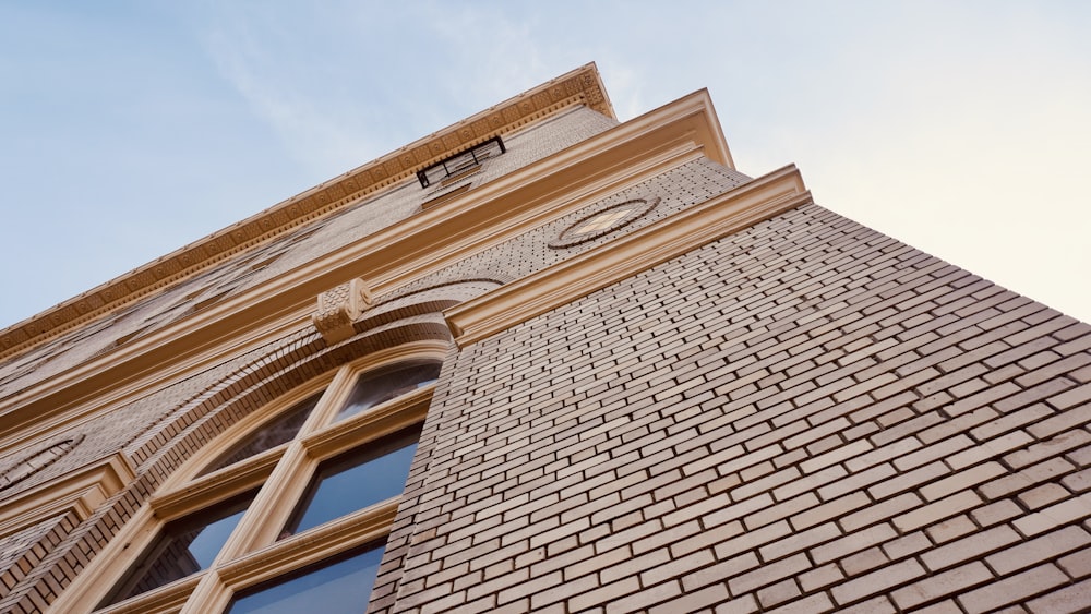 brown concrete building under blue sky during daytime