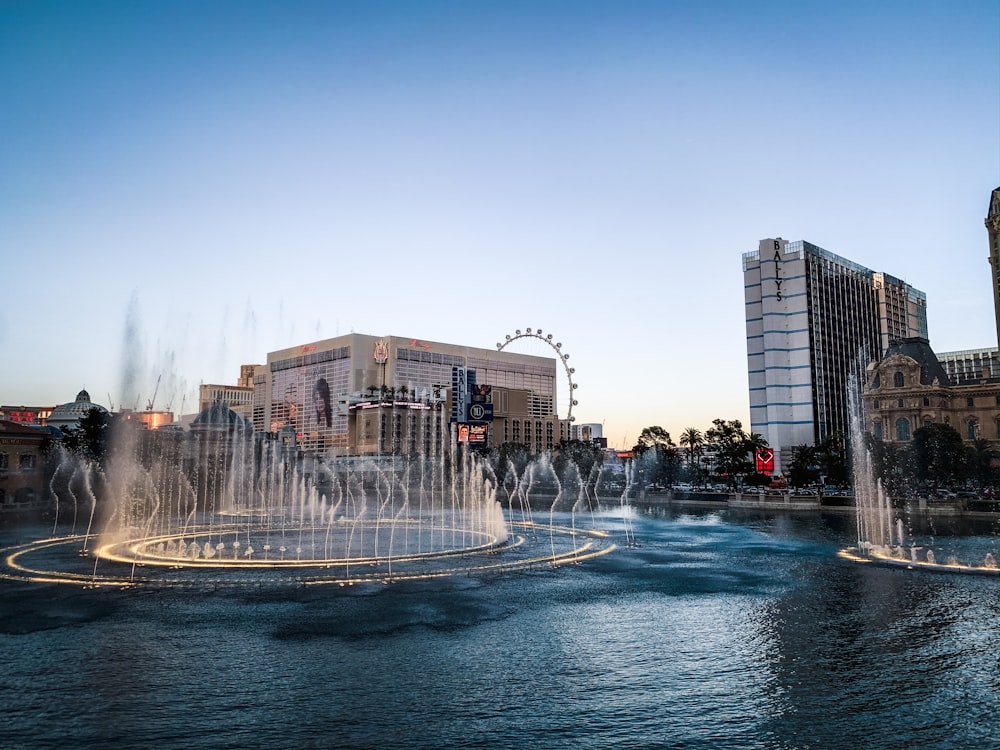 water fountain in the middle of the city during daytime