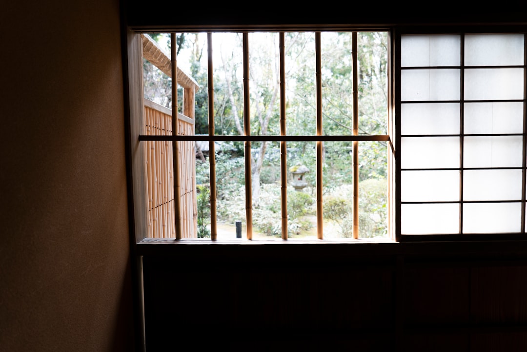 brown wooden framed glass window