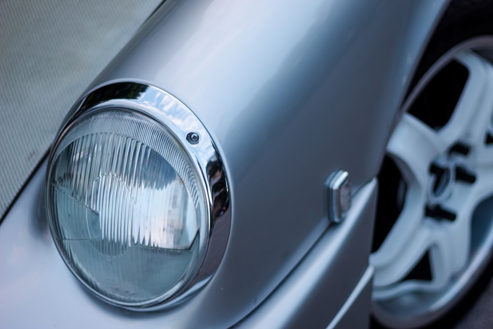 silver car with white light