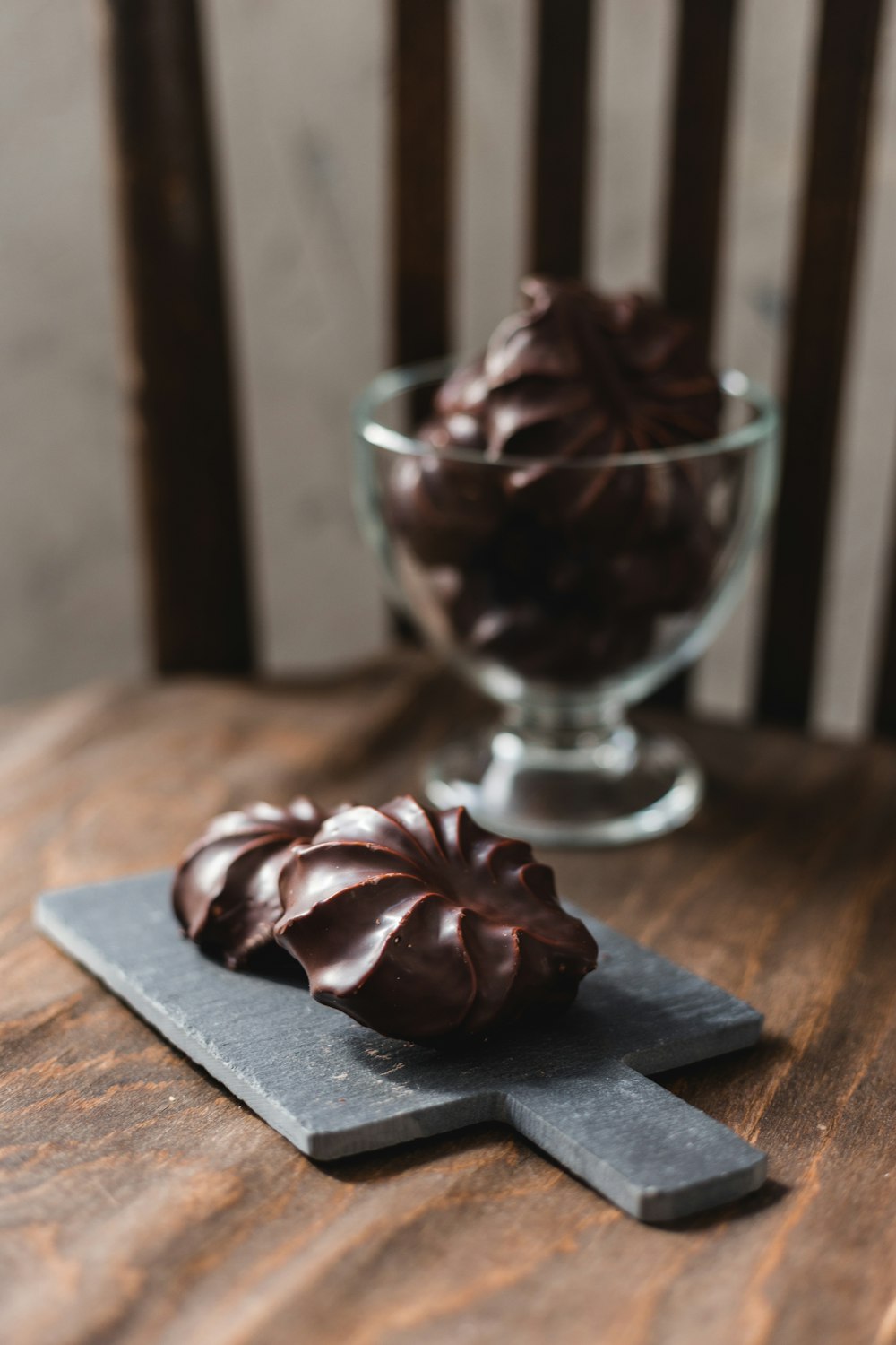 chocolate ice cream in clear glass bowl