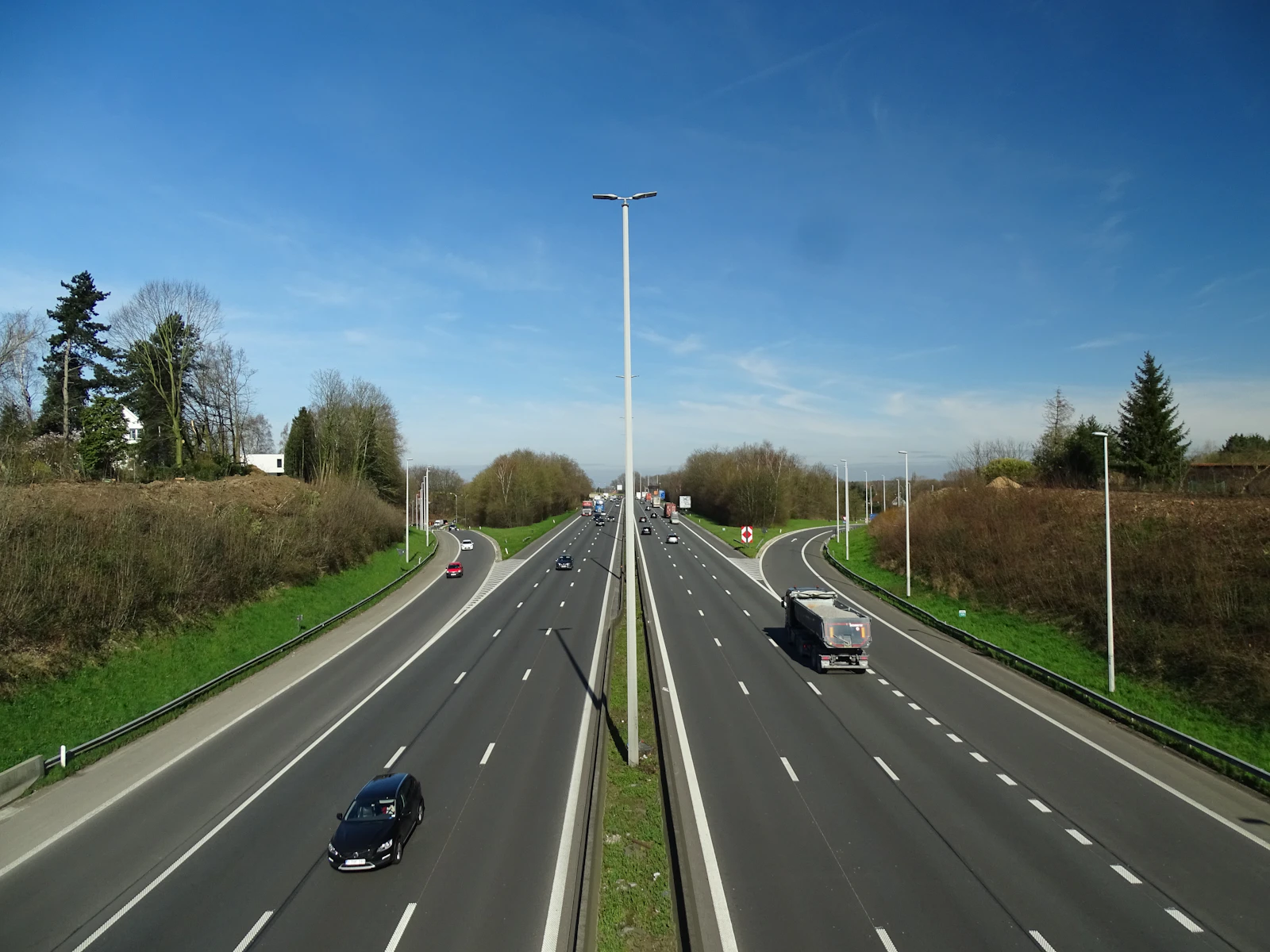 Traffic moving along a divided motorway outside Brussels