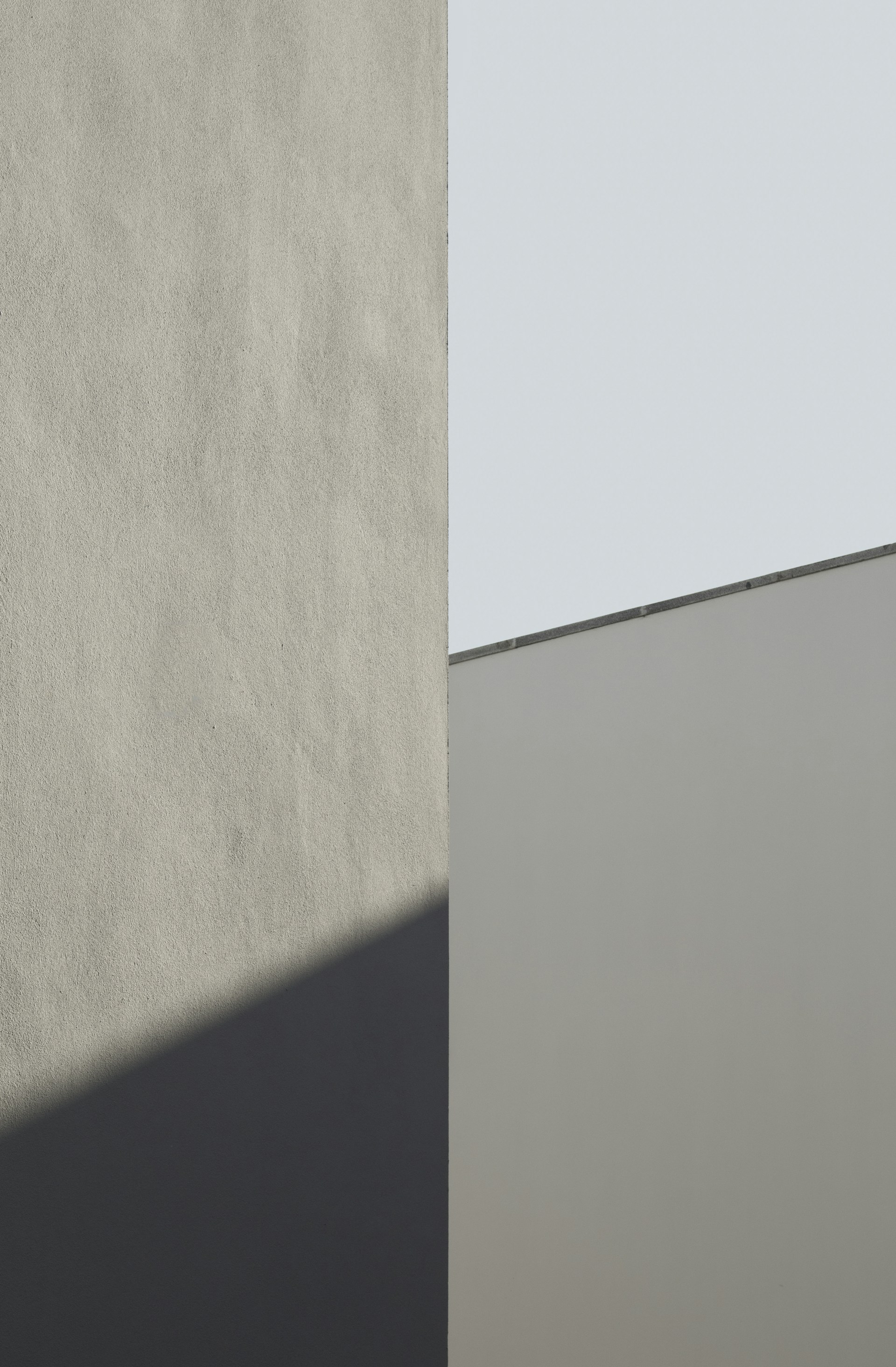 white concrete wall during daytime