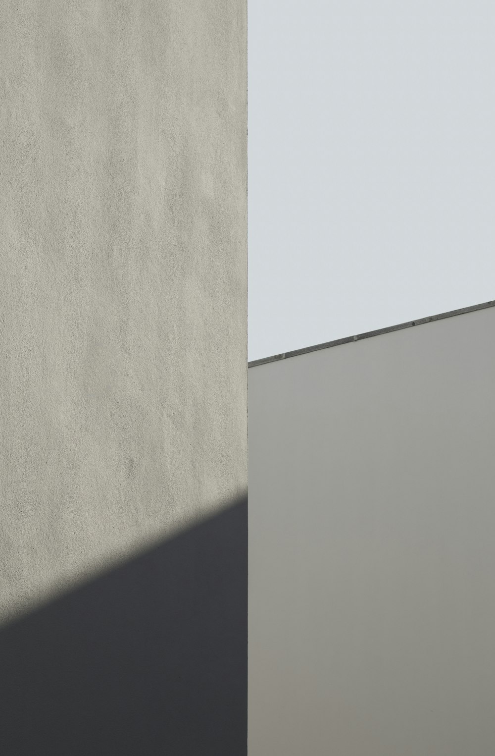 white concrete wall during daytime