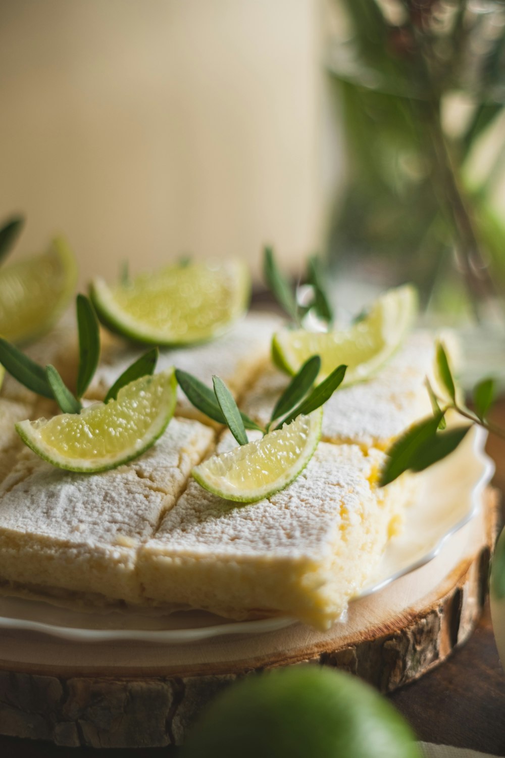 sliced bread with green vegetable on white ceramic plate