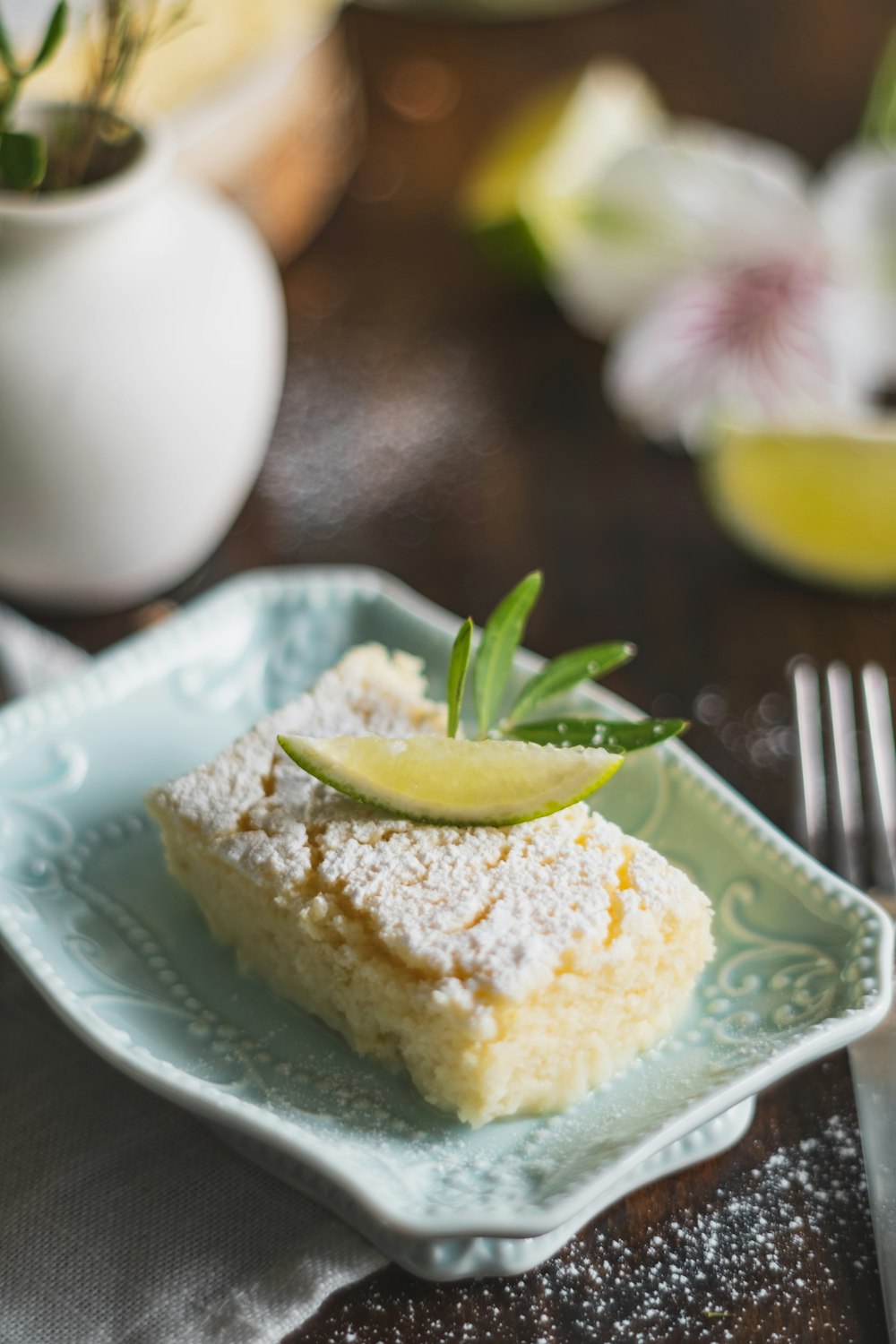 sliced cake on blue and white ceramic plate