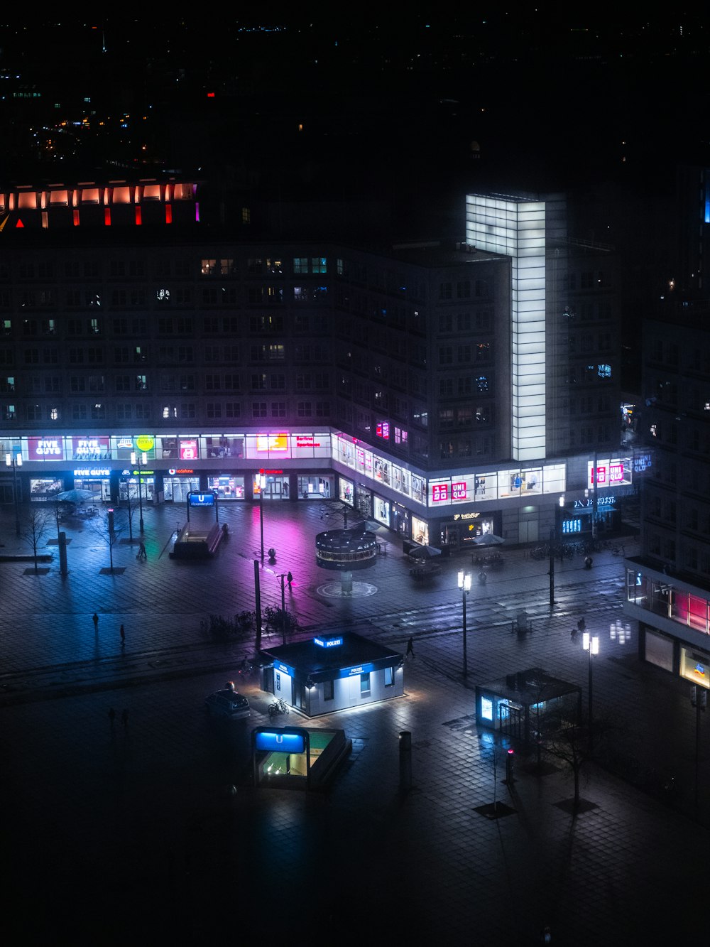 white car on road during night time